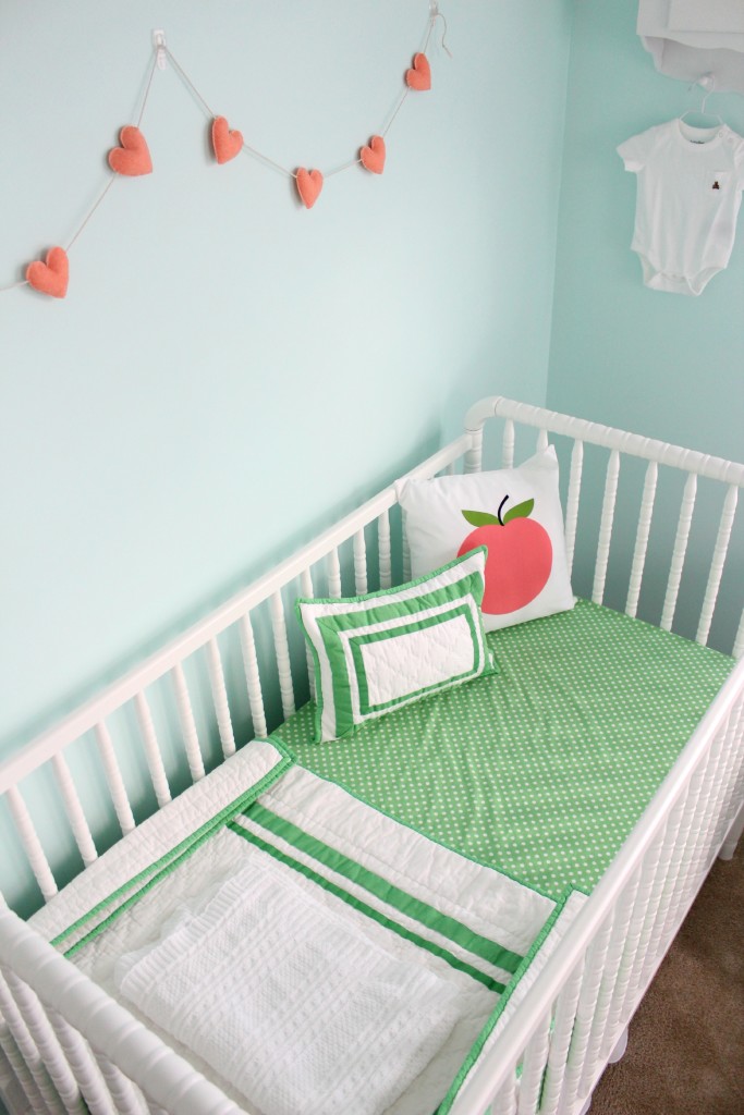 spring green, aqua, and peach gender neutral nursery decor