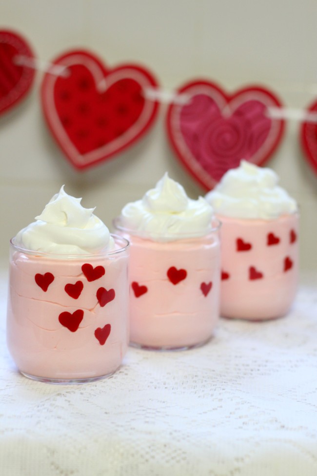 Valentine's Day Easy Heart Dessert Cups made with pudding, whipped topping, and candy melts