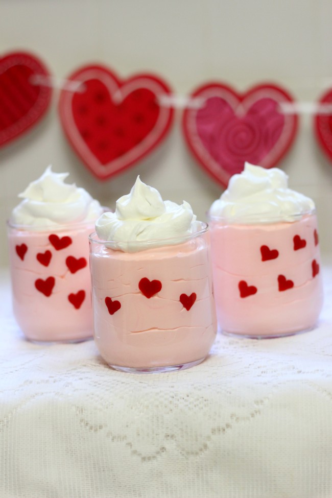 Valentine's Day Easy Heart Dessert Cups made with pudding, whipped topping, and candy melts