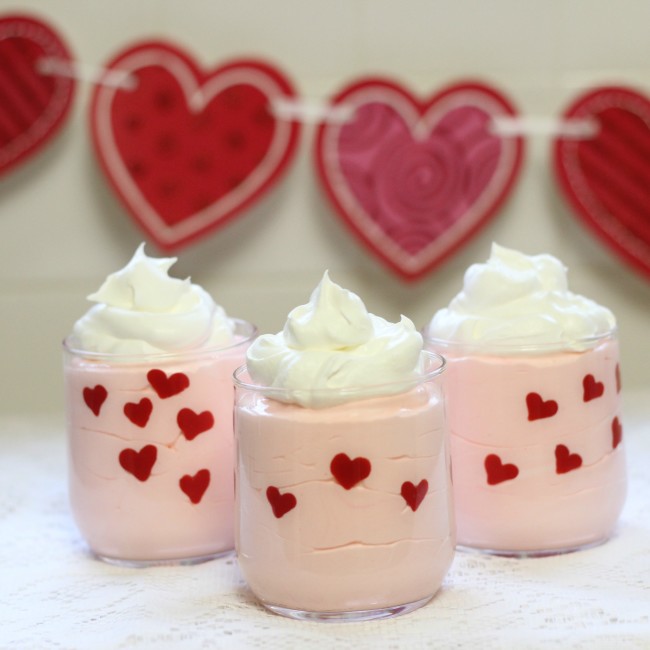 Valentine's Day Easy Heart Dessert Cups made with pudding, whipped topping, and candy melts