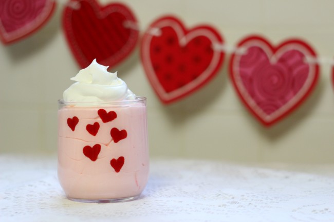 Valentine's Day Easy Heart Dessert Cups made with pudding, whipped topping, and candy melts