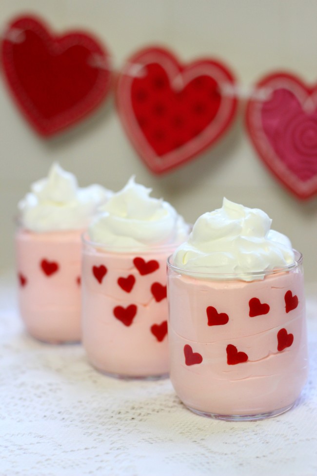 Valentine's Day Easy Heart Dessert Cups made with pudding, whipped topping, and candy melts