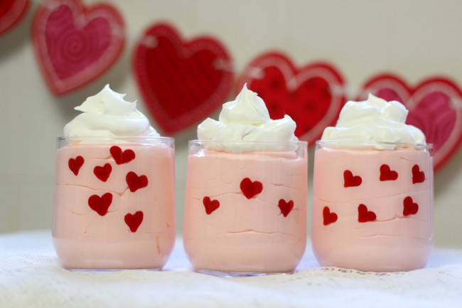 Valentine's Day Easy Heart Dessert Cups made with pudding, whipped topping, and candy melts