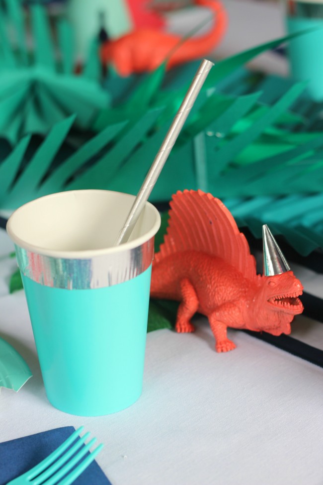 cup and dinosaur